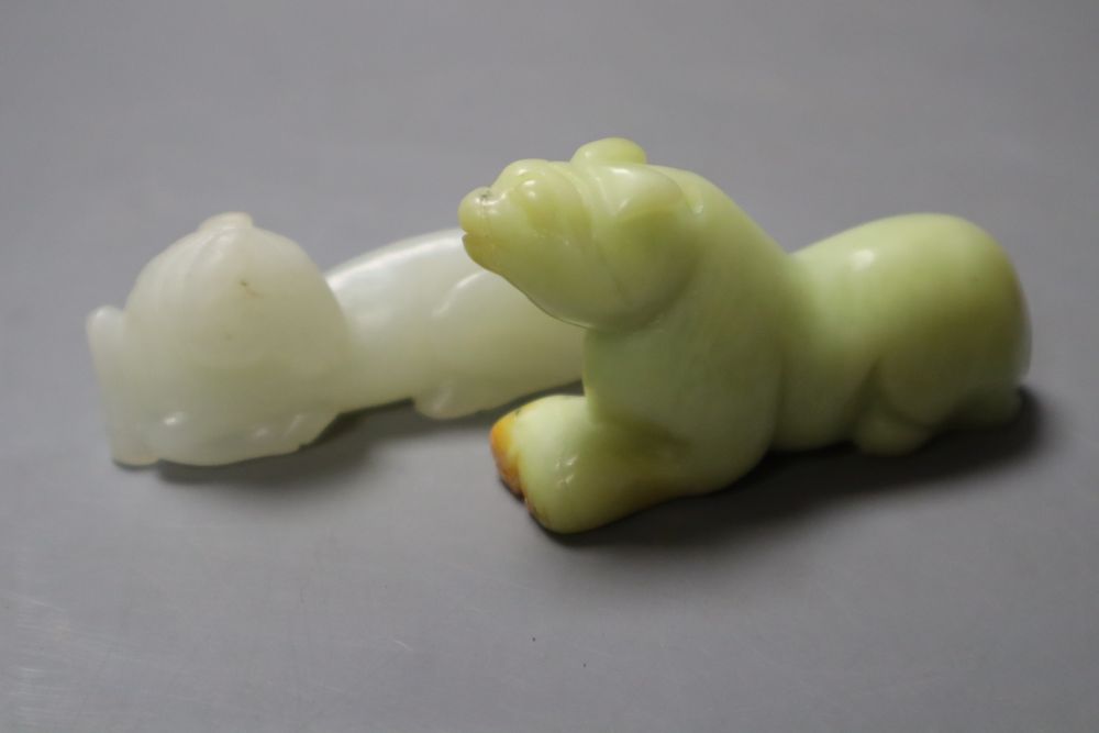 A Chinese pale celadon jade figure of a recumbent horse, 6.4cm and a hardstone figure of a beast,, 7cm